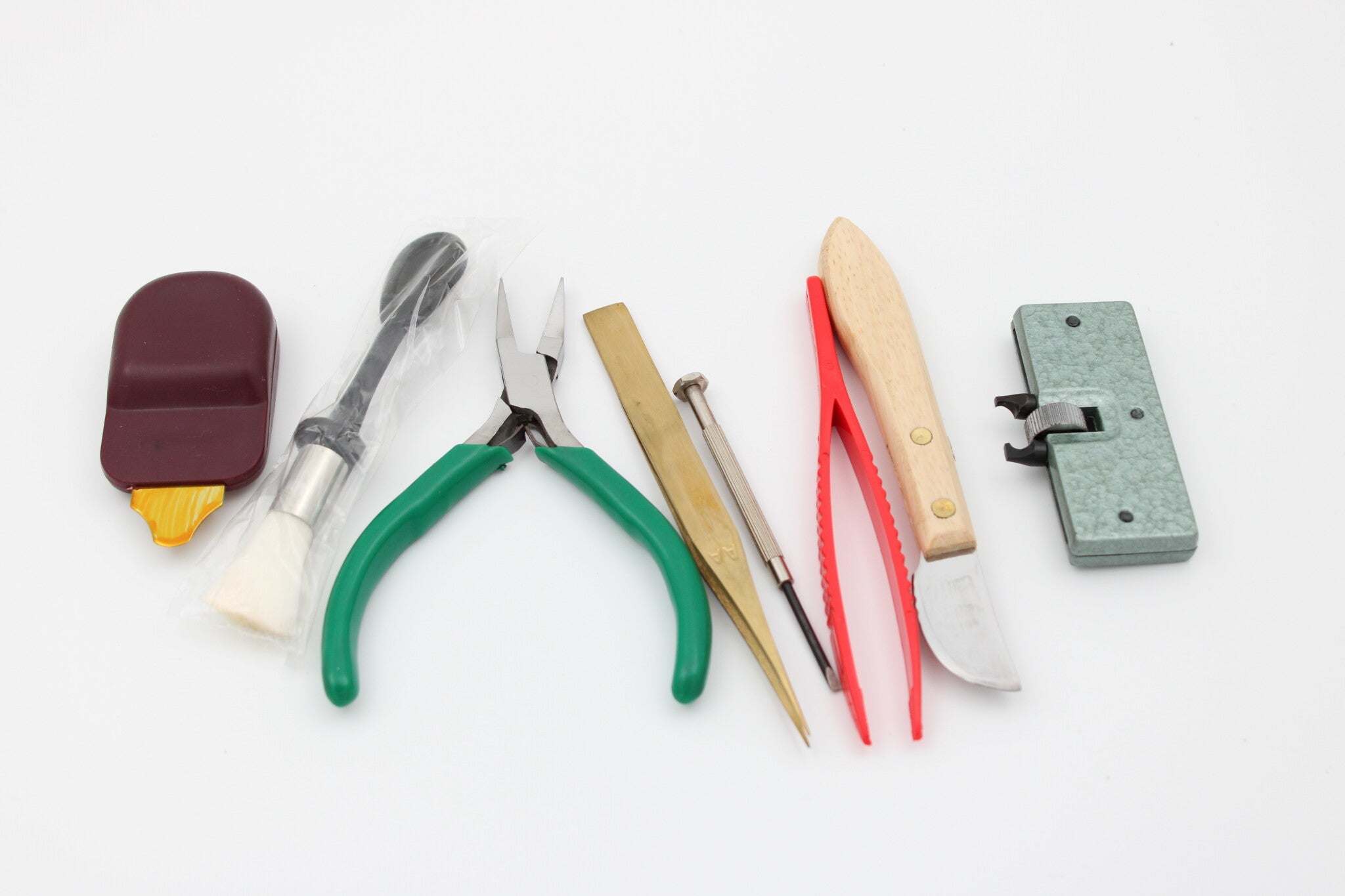 Værktøjssæt til at skifte batteri i et ur